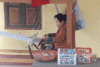 Woman Working Loom